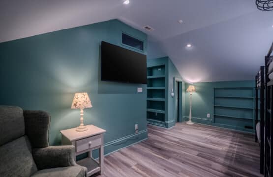 The Oaks Bedroom #5 with Four (4) Queen Bunk Beds, Built-In Desk Area, Ceiling Fan and En Suite Bathroom with Tub and Shower
